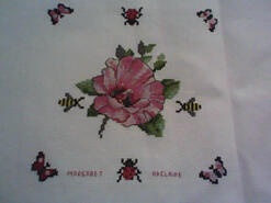 Cross stitch square for Flower Stitch-a-long.'s quilt