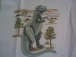 Cross stitch square for Dinosaur Stitch-A-Long's quilt